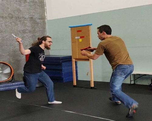 training session involving a charging knife attack